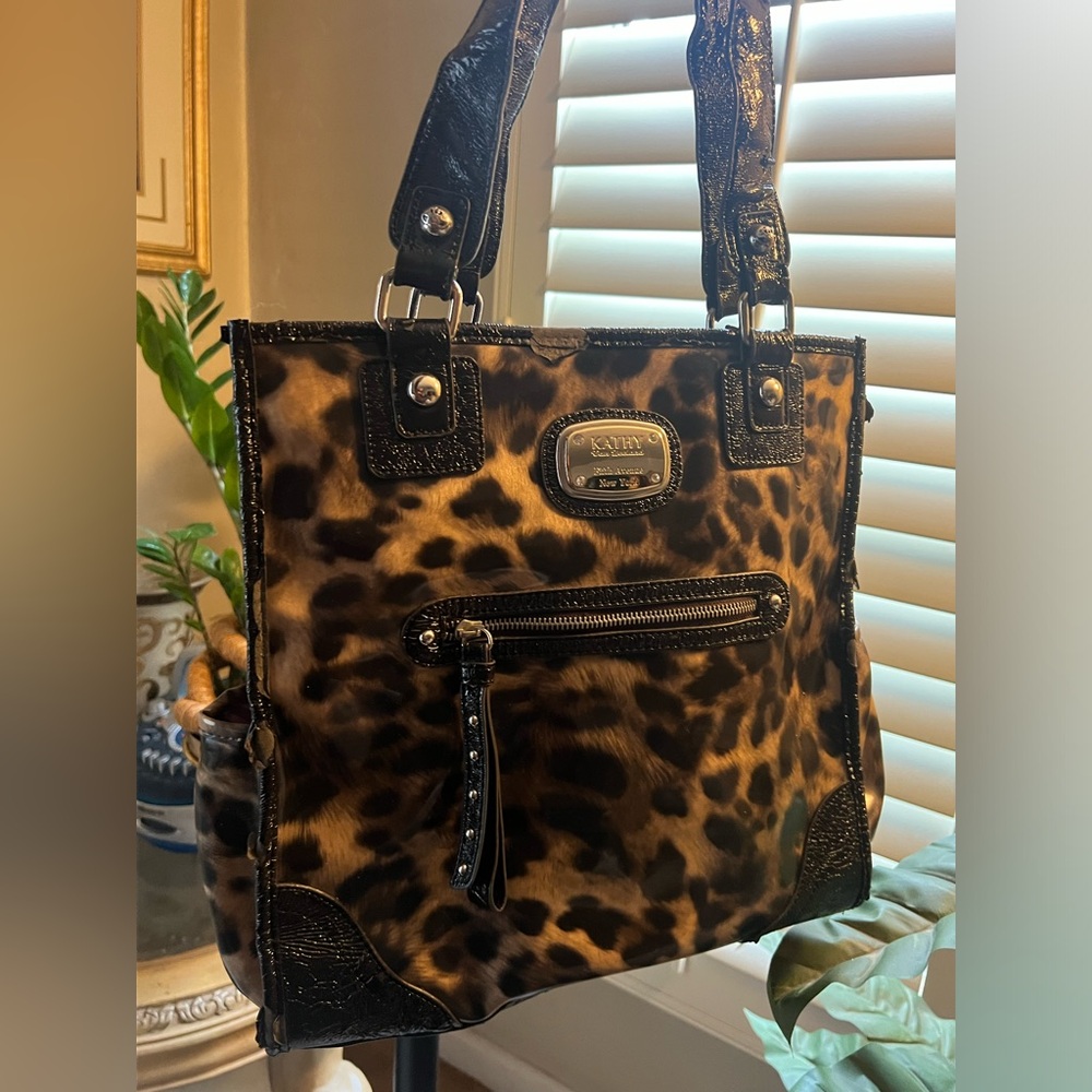 Gently used cheetah print shopper
